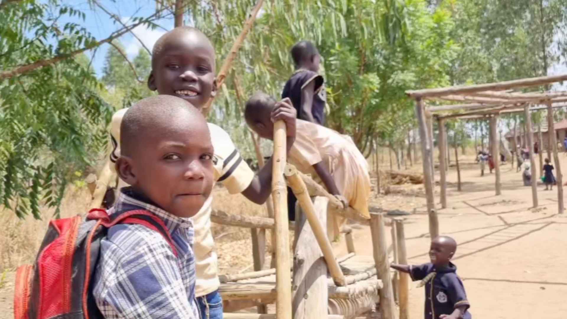 Students with bamboo in Okere City